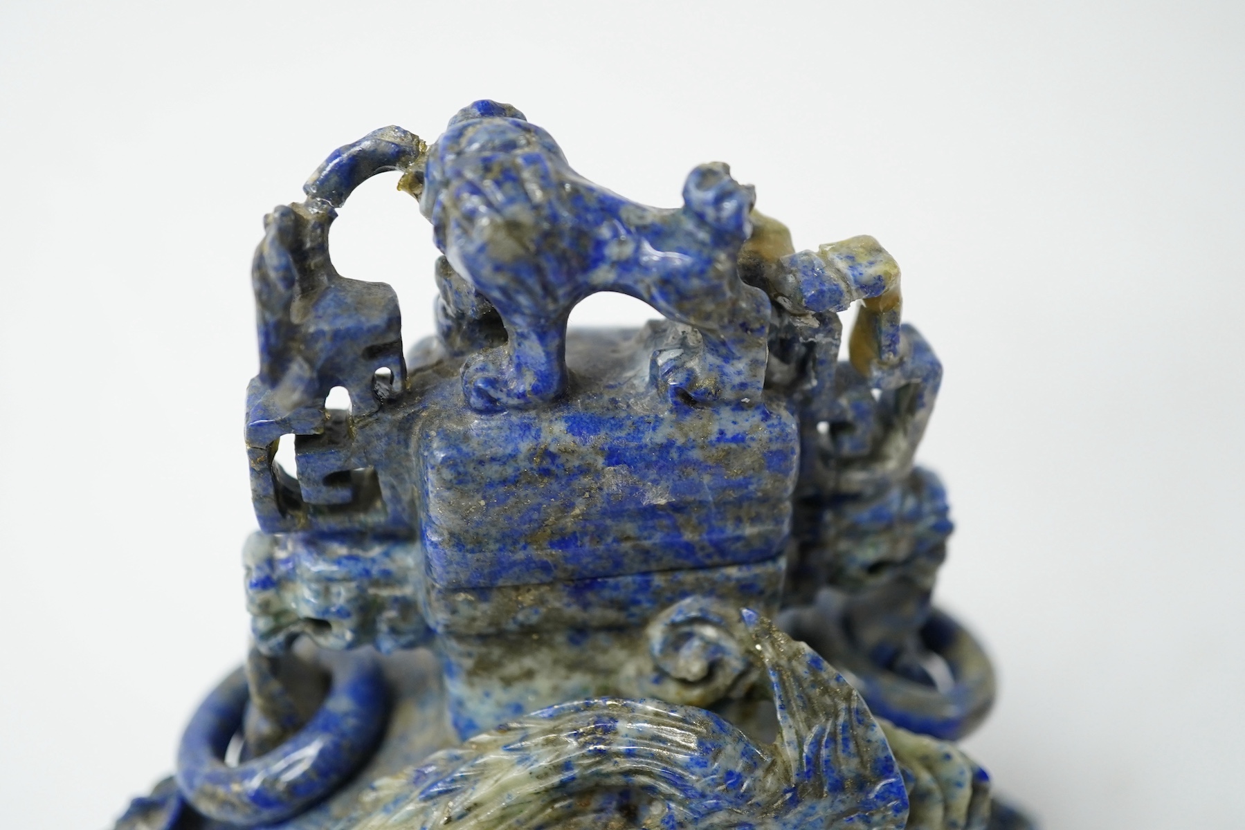 A Chinese lapis lazuli vase and cover, late 19th/early 20th century, 14cm high. Condition - fair, minor chips